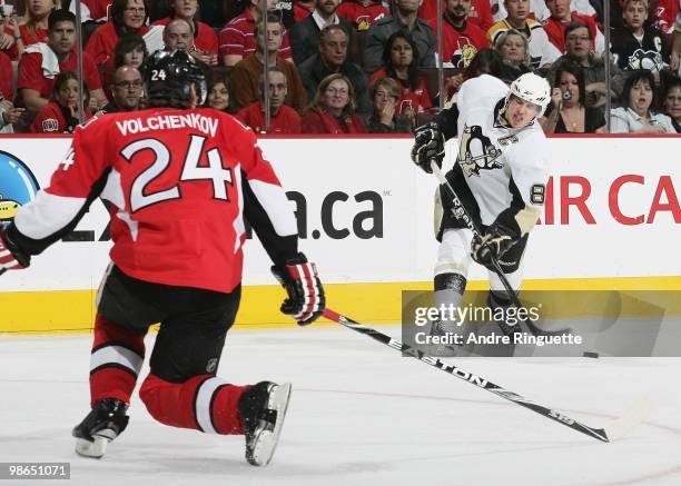 Anton Volchenkov of the Ottawa Senators drops to a knee to block a slapshot by Sidney Crosby of the Pittsburgh Penguins in Game Six of the Eastern...