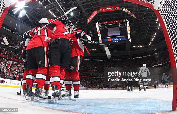 Daniel Alfredsson and Matt Cullen of the Ottawa Senators celebrate a second period goal against the Pittsburgh Penguins in Game Six of the Eastern...