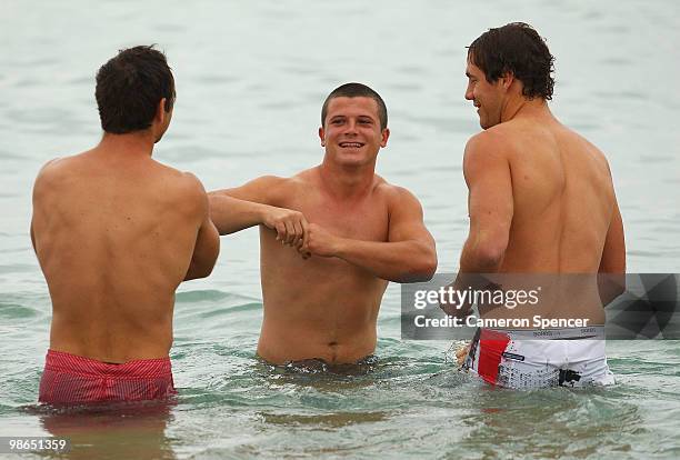 Jarred Moore of the Swans talks to team mates during a Sydney Swans AFL recovery session at Coogee Beach on April 25, 2010 in Sydney, Australia.