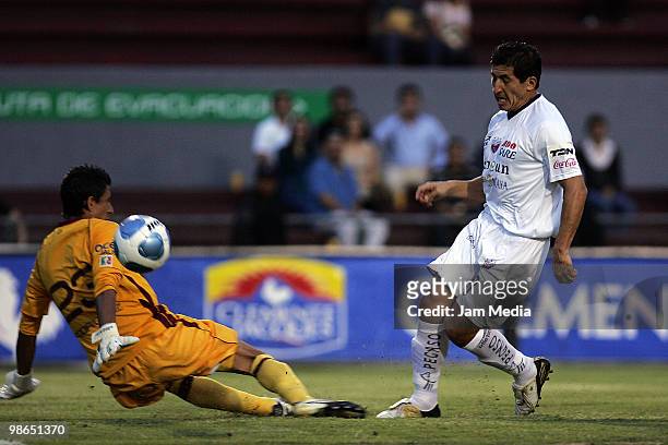 Mario Rodruguez of Estudiantes fights for the ball with Johan Fano of Atlante during their match as part of the Bicentenario 2010 Tournament at 3 de...