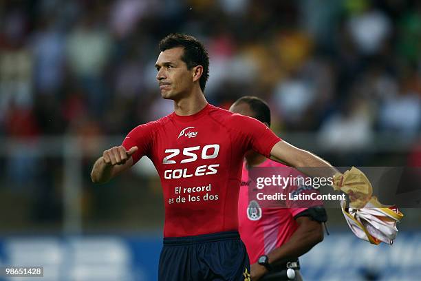 Morelia's Jared Borgetti celebrates after scoring a goal against Monterrey in a 2010 Bicentenary Mexican championship soccer match between Monarcas...