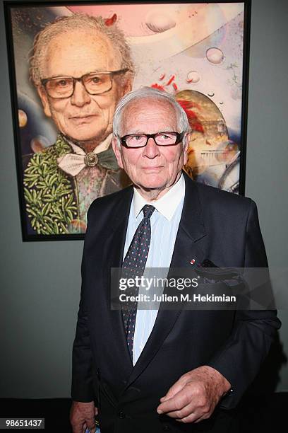 Pierre Cardin poses in front of his portrait during the launch of the 'Digital Fine Art' exhibition at Espace Pierre Cardin on April 24, 2010 in...