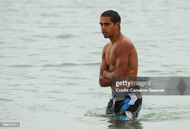 Lewis Jetta of the Swans wades throught the water during a Sydney Swans AFL recovery session at Coogee Beach on April 25, 2010 in Sydney, Australia.