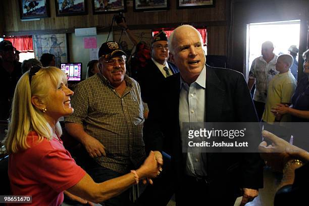 Sen. John McCain greets patrons at VFW Post during a campaign stop on April 24, 2010 in Casa Grande, Arizona. McCain, who is seeking a fifth term in...