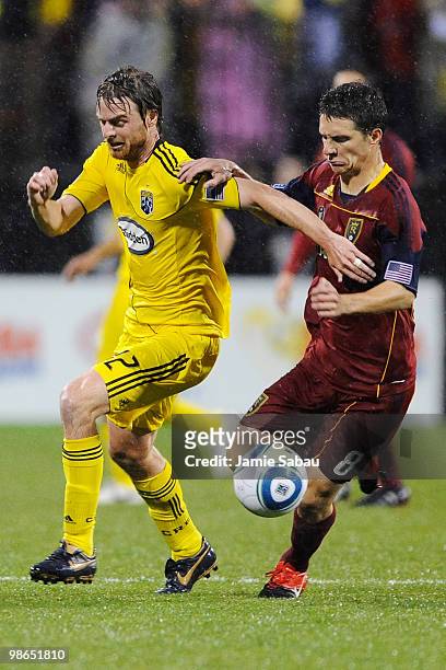 Midfielder Eddie Gaven of the Columbus Crew and midfielder Will Johnson of Real Salt Lake chase down the ball on April 24, 2010 at Crew Stadium in...