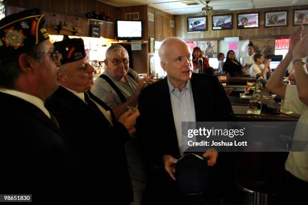 Sen. John McCain greets veterans at VFW Post during a campaign stop on April 24, 2010 in Casa Grande, Arizona. McCain, who is seeking a fifth term in...