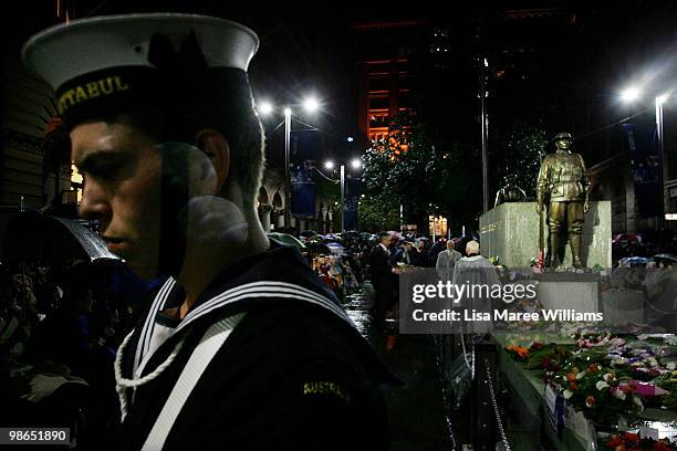 Crowds gather for the ANZAC Day Dawn Service in the rain at the Cenotaph at Martin Place on April 25, 2010 in Sydney, Australia. Veterans,...