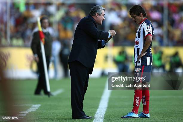 Coach Victor Vucetich of Monterrey instructs Neri Cardozo during a 2010 Bicentenary Mexican championship soccer match between Monarcas Morelia and...