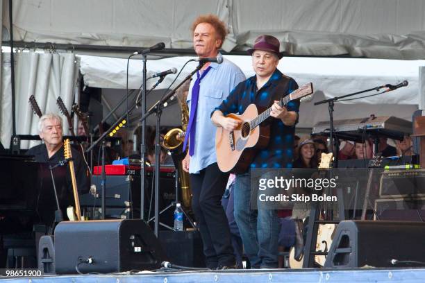 Paul Simon and Art Garfunkel perform during day 2 of the 41st annual New Orleans Jazz & Heritage Festival at the Fair Grounds Race Course on April...
