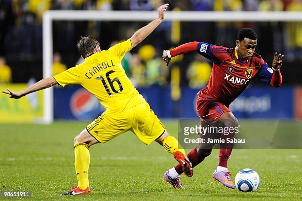 Forward Robbie Findley of Real Salt Lake controls the ball as midfielder Brian Carroll of the Columbus Crew attempts to defend on April 24, 2010 at...