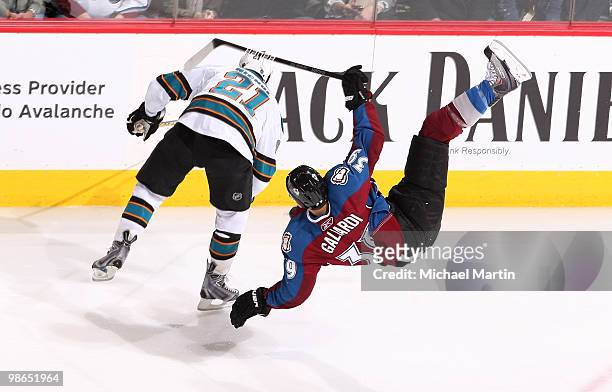 Galiardi of the Colorado Avalanche is up ended by Scott Nichol of the San Jose Sharks in game Six of the Western Conference Quarterfinals during the...