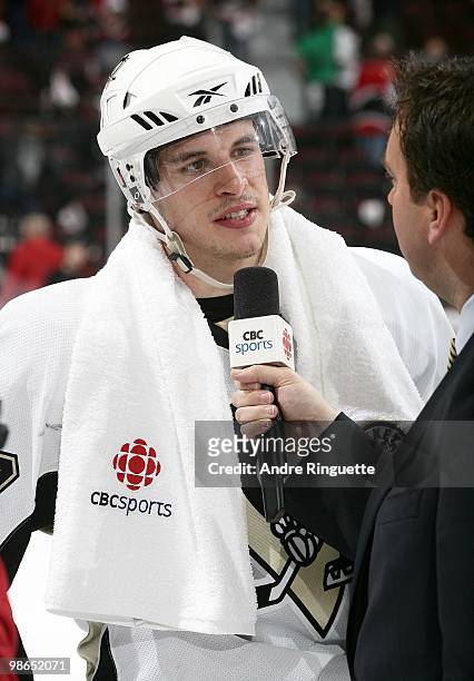Sidney Crosby of the Pittsburgh Penguins is interviewed after clinching the series against the Ottawa Senators in Game Six of the Eastern Conference...
