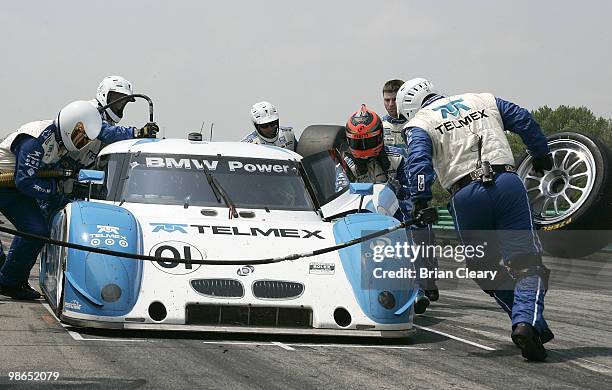 The BMW Riley of Scott Pruett and Memo Rojas makes a pit stop during the Bosch Engineering 250 at Virginia International Raceway on April 24, 2010 in...