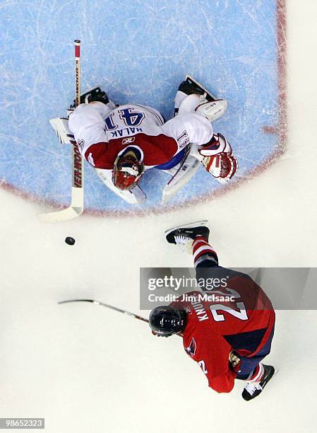 Mike Knuble of the Washington Capitals is stopped by Jaroslav Halak of the Montreal Canadiens in Game Five of the Eastern Conference Quarterfinals...