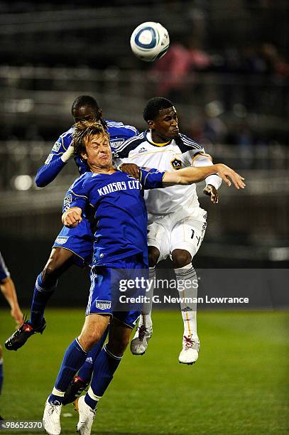 Michael Harrington of the Kansas City Wizards and Edson Buddle of the Los Angeles Galaxy battle for possession during an MLS match on April 24, 2010...