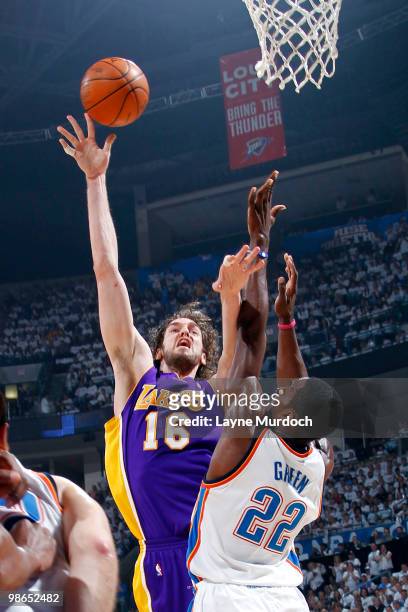 Pau Gasol of the Los Angeles Lakers shoots over Jeff Green of the Oklahoma City Thunder in Game Four of the Western Conference Quarterfinals during...
