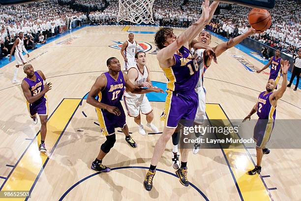 Thabo Sefolosha of the Oklahoma City Thunder goes to the basket against Pau Gasol of the Los Angeles Lakers in Game Four of the Western Conference...