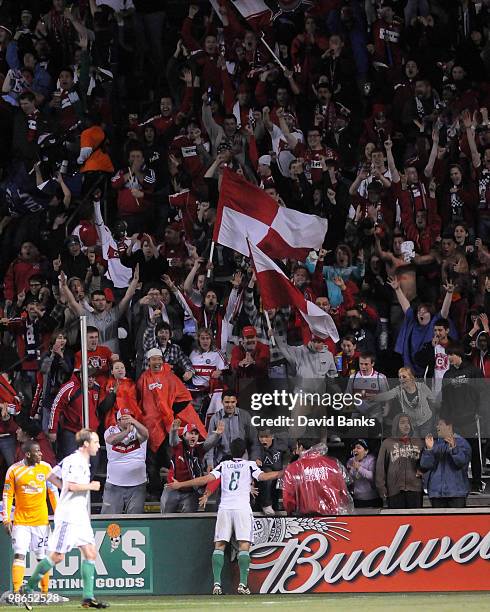 Peter Lowry of the Chicago Fire celebrates his goal against the Houston Dynamo with Fire fans in an MLS match on April 24, 2010 at Toyota Park in...