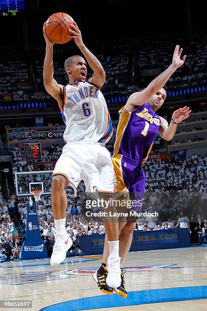 Eric Maynor of the Oklahoma City Thunder goes to the basket against Jordan Farmar of the Los Angeles Lakers in Game Four of the Western Conference...