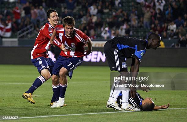 Justin Braun of Chivas USA reacts after his second half goal as Ike Opara of the San Jose Earthquakes looks after teammate Jason Hernandez during...