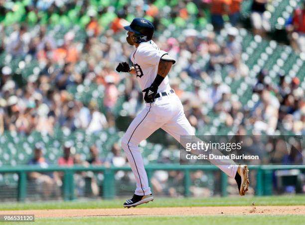Nicholas Castellanos of the Detroit Tigers rounds the bases after hitting a two-run home run against the Oakland Athletics during the first inning at...