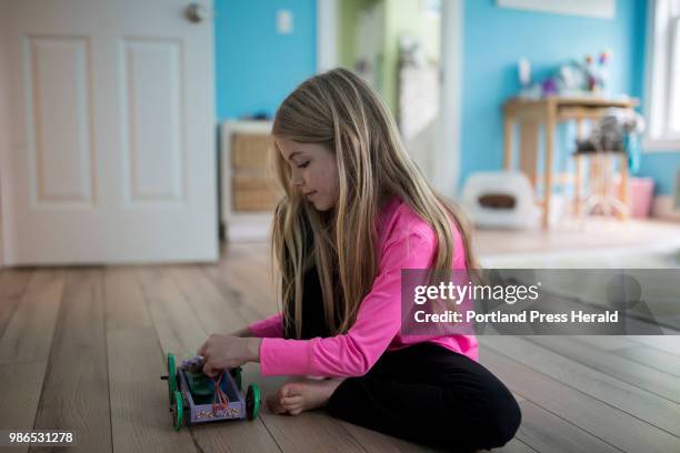 Rhys Cote plays in her room at her home in Wells. Rhys has been modeling since she was a toddler and has acted in commercials. She was in her first...