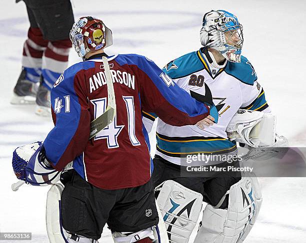 Goaltender Craig Anderson of the Colorado Avalanche shakes hands with fellow goaltender Evgeni Nabokov of the San Jose Sharks after Game Six of the...