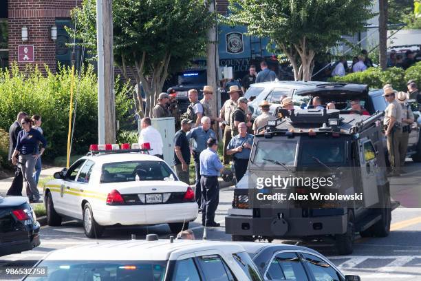 Police respond to a shooting on June 28, 2018 in Annapolis, Maryland. - At least five people were killed Thursday when a gunman opened fire inside...