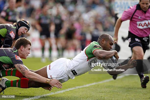 Rhys Wesser of the Rabbitohs scores a try during the round seven NRL match between the Canberra Raiders and the South Sydney Rabbitohs at Canberra...