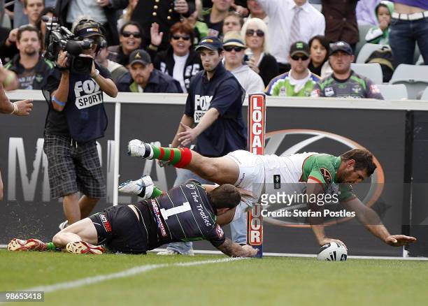 David Taylor of the Rabbitohs scores a try during the round seven NRL match between the Canberra Raiders and the South Sydney Rabbitohs at Canberra...