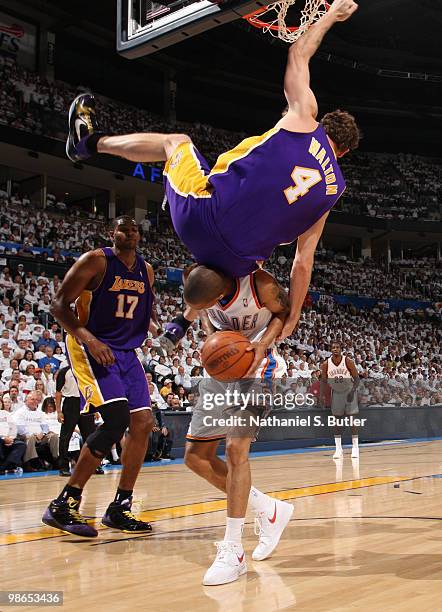 Luke Walton of the Los Angeles Lakers topples over Eric Maynor of the Oklahoma City Thunder in Game Four of the Western Conference Quarterfinals...