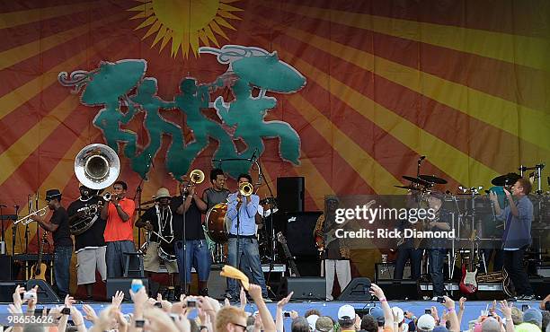 Solidgers brass Band walk on Simon & Garfunkel makeing their first-ever appearance at the New Orleans Jazz & Heritage L/R Art Garfunkel and Paul...