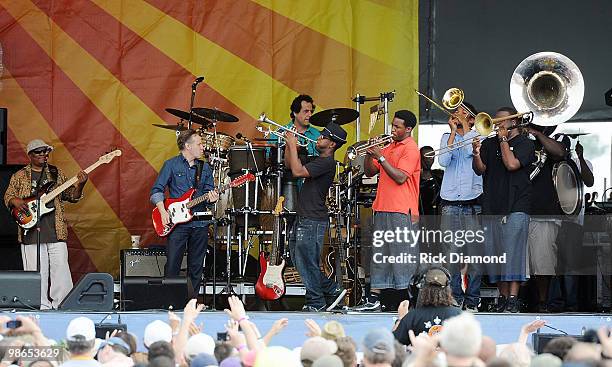 Solidgers brass Band walk on Simon & Garfunkel makeing their first-ever appearance at the New Orleans Jazz & Heritage L/R Art Garfunkel and Paul...