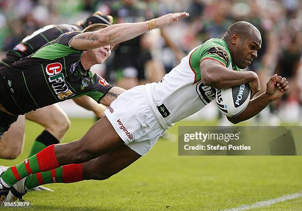 Rhys Wesser of the Rabbitohs scores a try during the round seven NRL match between the Canberra Raiders and the South Sydney Rabbitohs at Canberra...