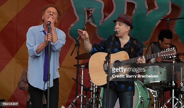 Paul Simon and Art Garfunkel of Simon & Garfunkel perform during day 2 of the 41st annual New Orleans Jazz & Heritage Festival at the Fair Grounds...