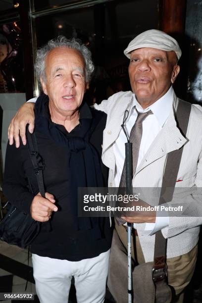 Gilles Bensimon and Guy Cuevas attend the Tan Giudicelli - Exhibition of drawings and accessories preview at Galerie Pierre Passebon on June 28, 2018...