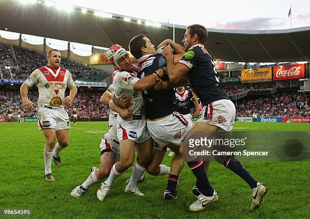 Aidan Guerra of the Roosters is tackled over the sideline during the round seven NRL match between the St George Illawarra Dragons and the Sydney...