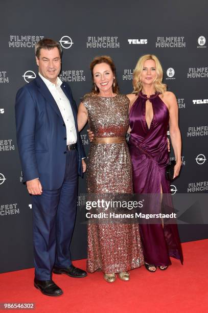 Markus Soeder, Bavarian Prime Minister, Diana Iljine and Veronica Ferres during the opening night of the Munich Film Festival 2018 at Mathaeser...