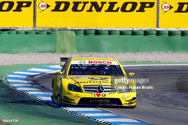 Mercedes driver David Coulthard of Scotland steers his car during the warm up of the DTM 2010 German Touring Car Championship on April 25, 2010 in...