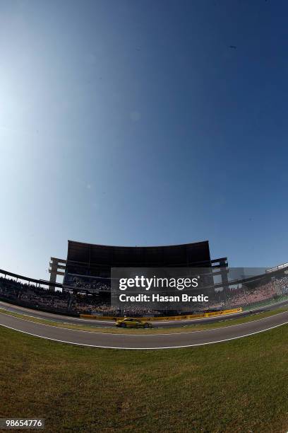 Mercedes driver David Coulthard of Scotland steers his car during the warm up of the DTM 2010 German Touring Car Championship on April 25, 2010 in...