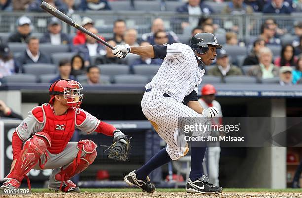 Curtis Granderson of the New York Yankees bats against the Los Angeles Angels of Anaheim during the Yankees home opener at Yankee Stadium on April...