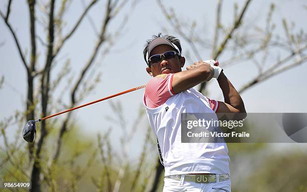 Thongchai Jaidee of Thailand tees off on the 12th hole during the Round Three of the Ballantine's Championship at Pinx Golf Club on April 25, 2010 in...