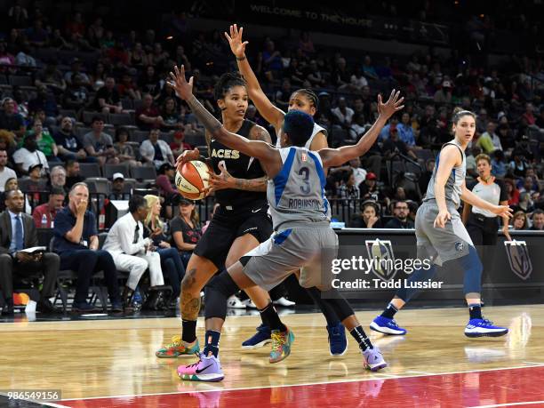 Tamera Young of the Las Vegas Aces handles the ball during the game against the Minnesota Lynx on June 24, 2018 at the Mandalay Bay Events Center in...