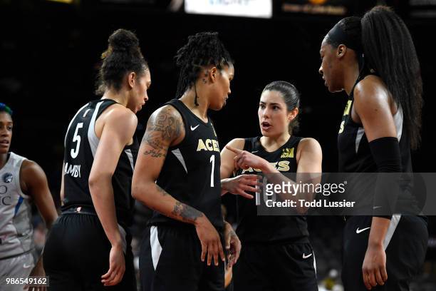Kelsey Plum of the Las Vegas Aces talks to teammate Tamera Young during the game against the Minnesota Lynx on June 24, 2018 at the Mandalay Bay...