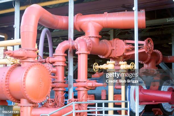 colorful pipes at gasworks - gasworks stock pictures, royalty-free photos & images