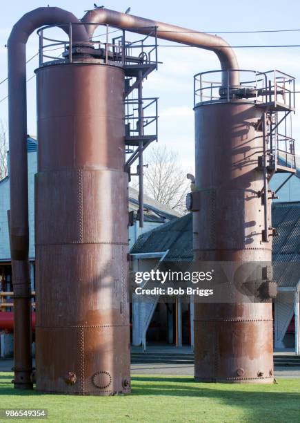 twin pipes at gasworks - gasworks stock pictures, royalty-free photos & images