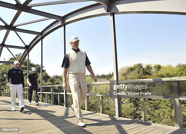 Ernie Els of South Africa crosses a bridge on the 16th hole during the Round Three of the Ballantine's Championship at Pinx Golf Club on April 25,...