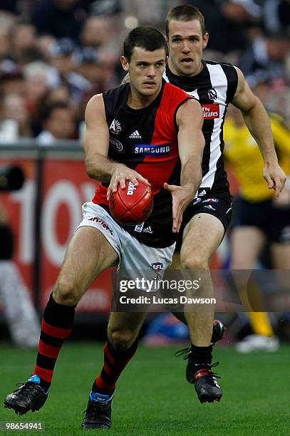 Brent Stanton of the Bombers kicks the ball during the round five AFL match between the Collingwood Magpies and the Essendon Bombers at Melbourne...