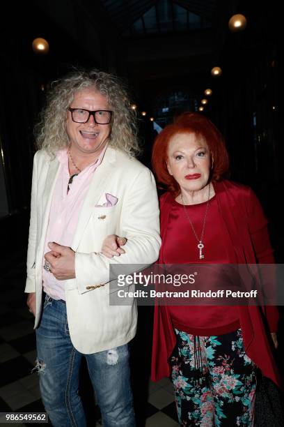 Pierre-Jean Chalencon and singer Regine attend the Tan Giudicelli - Exhibition of drawings and accessories preview at Galerie Pierre Passebon on June...