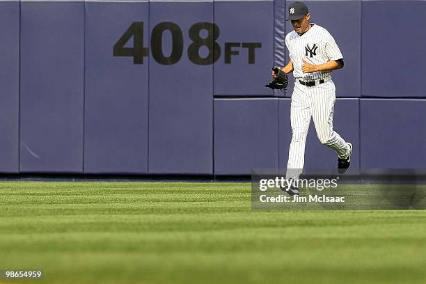 Mariano Rivera of the New York Yankees runs in to pitch against the Los Angeles Angels of Anaheim during the Yankees home opener at Yankee Stadium on...